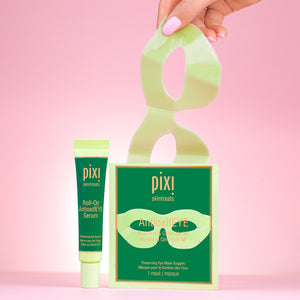 PIXI skincare products including AntioxifEYE Eye Mask Goggles and Roll-on AntioxifEYE serum on a pink background with hand reaching