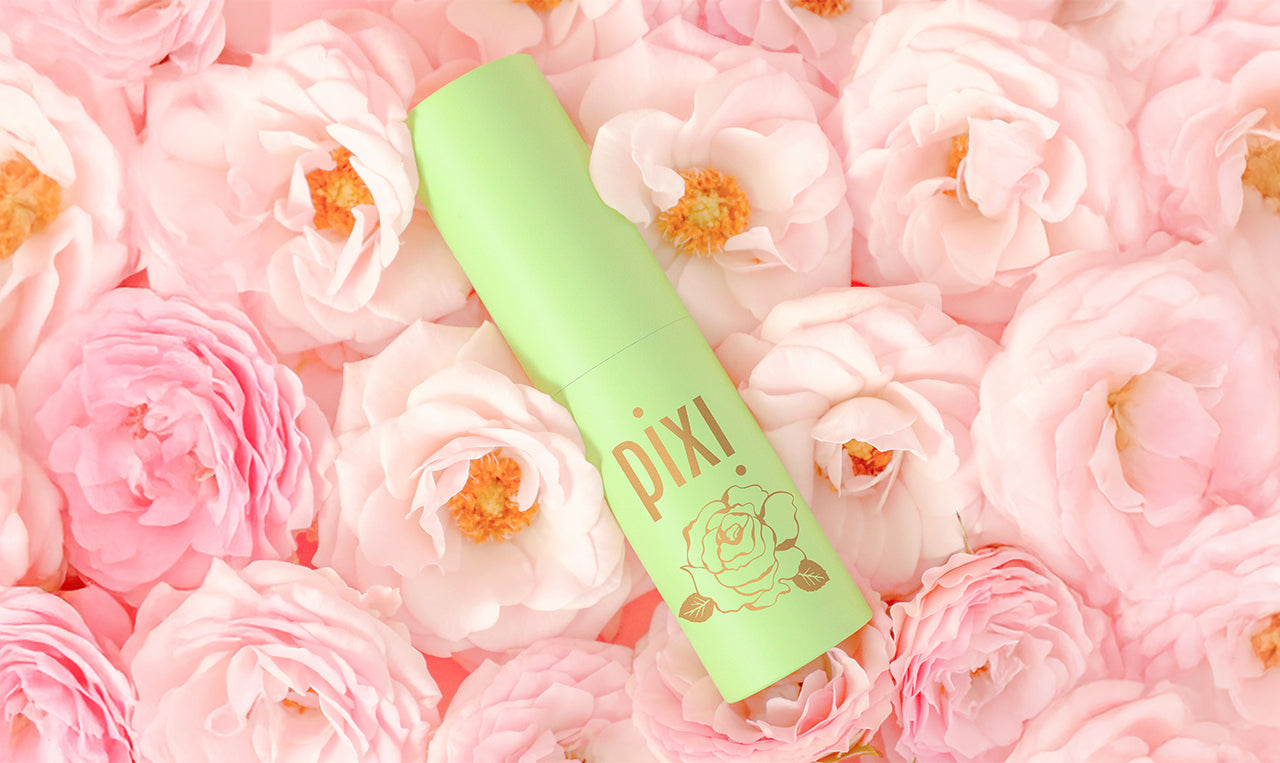 PixiPerfume in PixiRose shown on a bed of roses