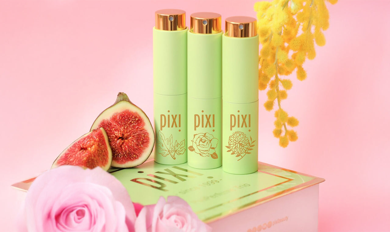 PixiPerfume Gift Trio on a pink background