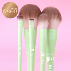 Gift With Purchase: Collection of 5 makeup brushes on a pink background