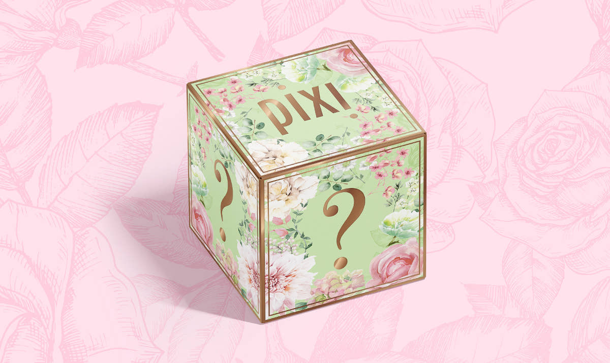 A pink Mystery Bundle box shown on a pink background 