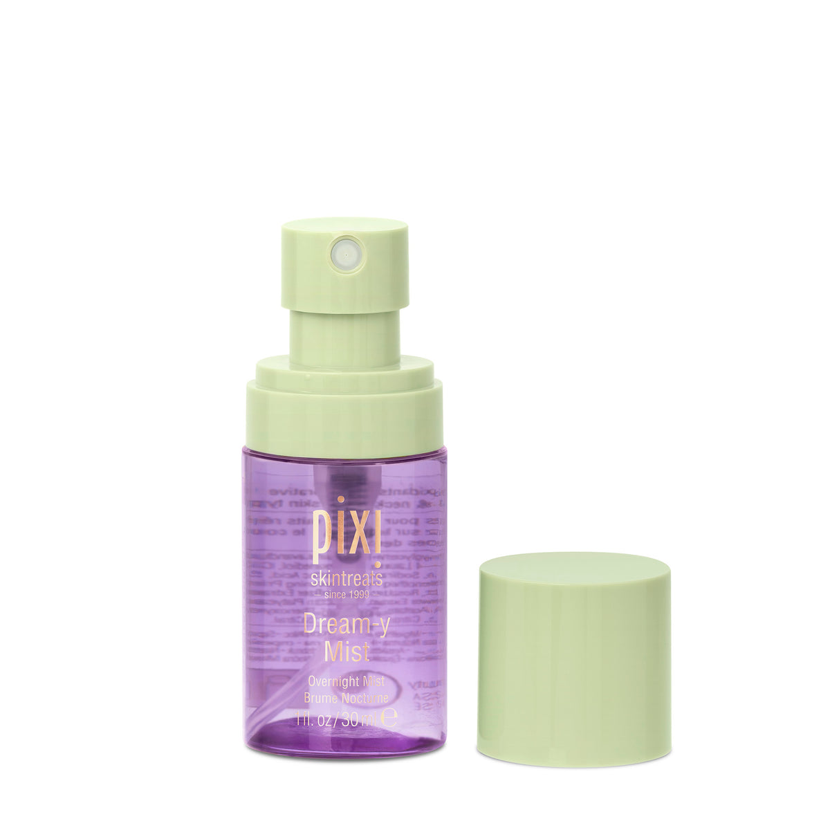 Pixi Skintreats Dreamy Mist overnight mist spray bottle in purple with a light green pump and cap, shown on a white background.